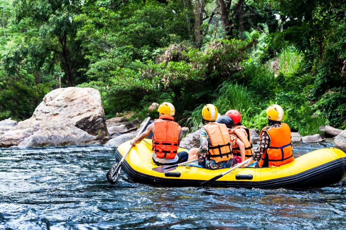 A group river rafting