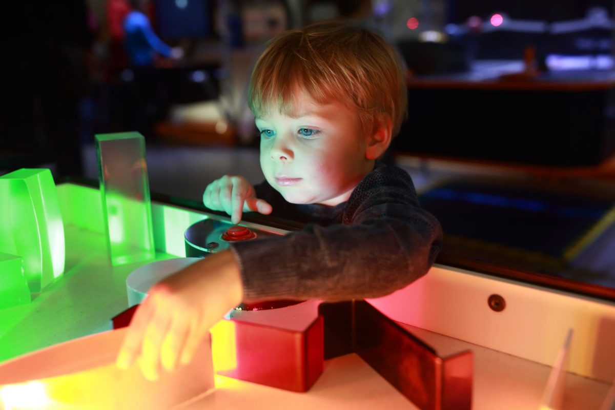 child at interactive museum exhibit